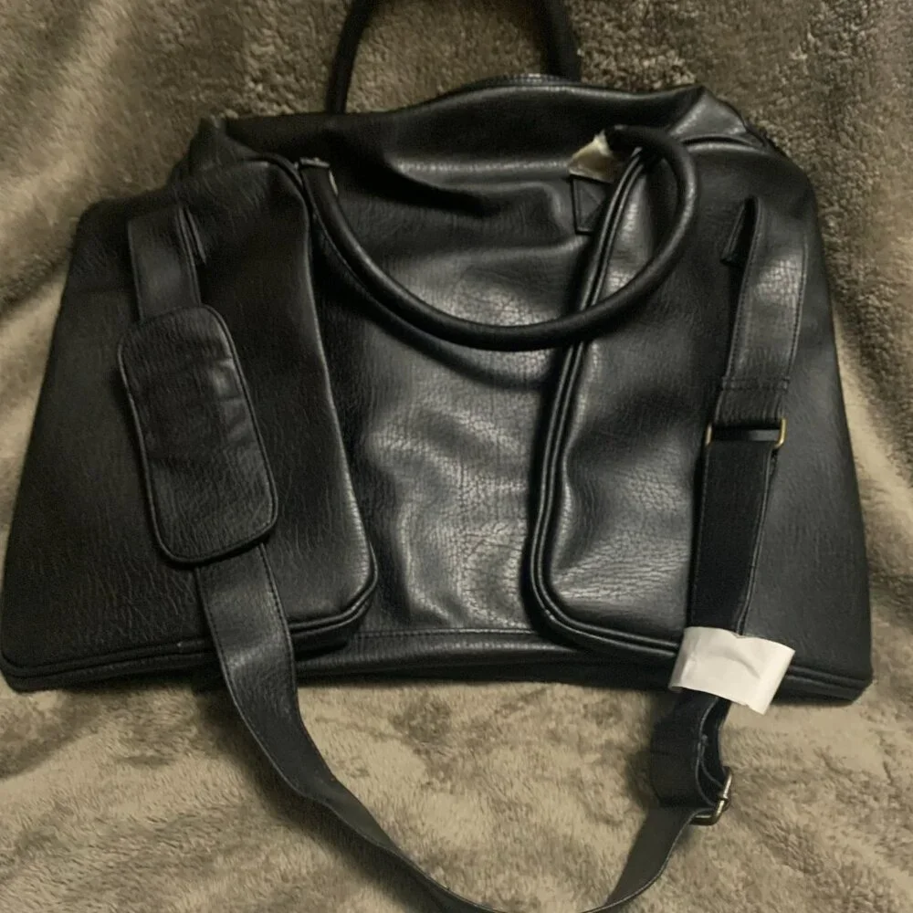 LEATHER TRAVEL BAG WITH STRAPS